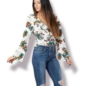 Gimmicks by BKE White Floral tropical Wrap Blouse with Bell Sleeves